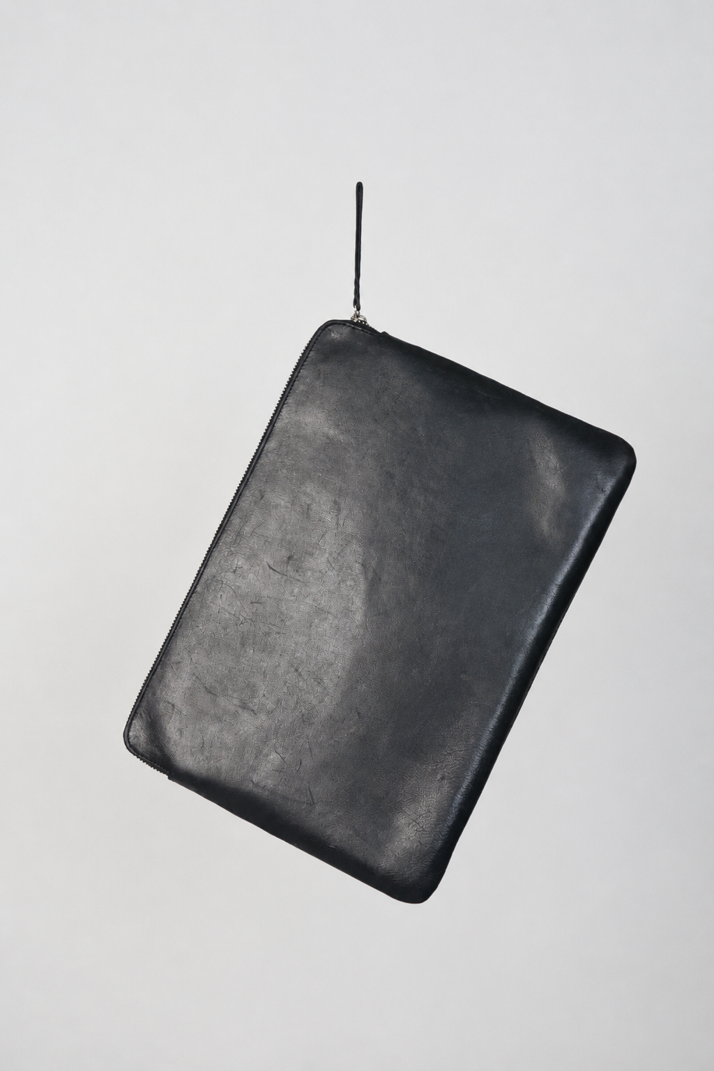 Back of the Corset laptop case in smooth black leather