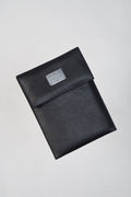 Black leather Shalom iPad and Kindle case by Violeta with an engraved silver Violeta plate on the flap, front view