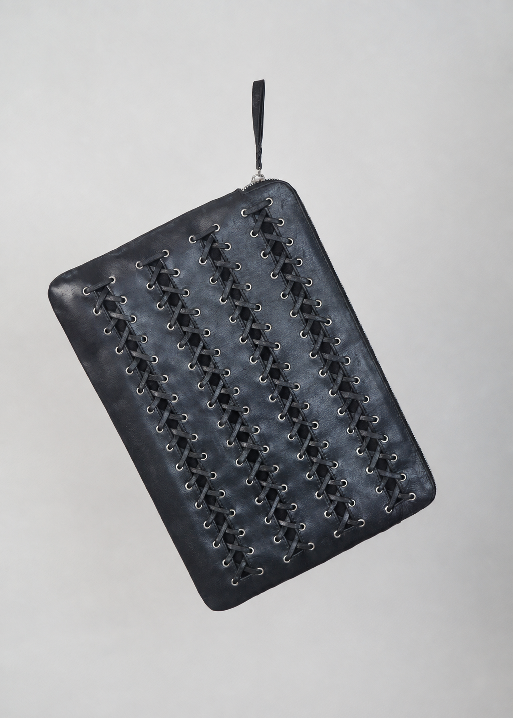 Black leather Corset laptop case by Violeta with rows of lace-up eyelet detailing, front view